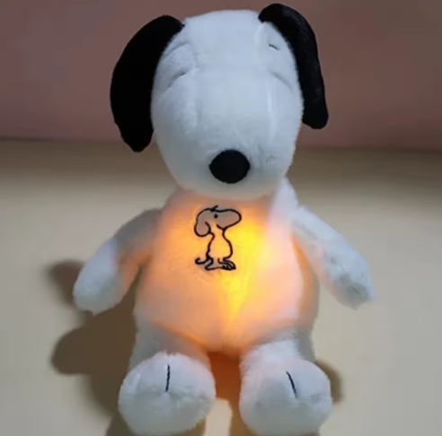 Peluche de Snoopy con luz y sonidos relajantes